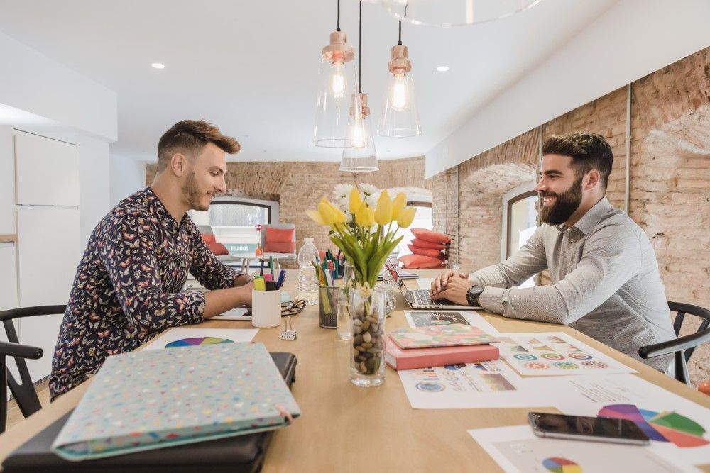 cheerful-men-working-office