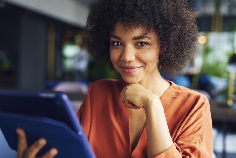 Portrait of beautiful African businesswoman at work