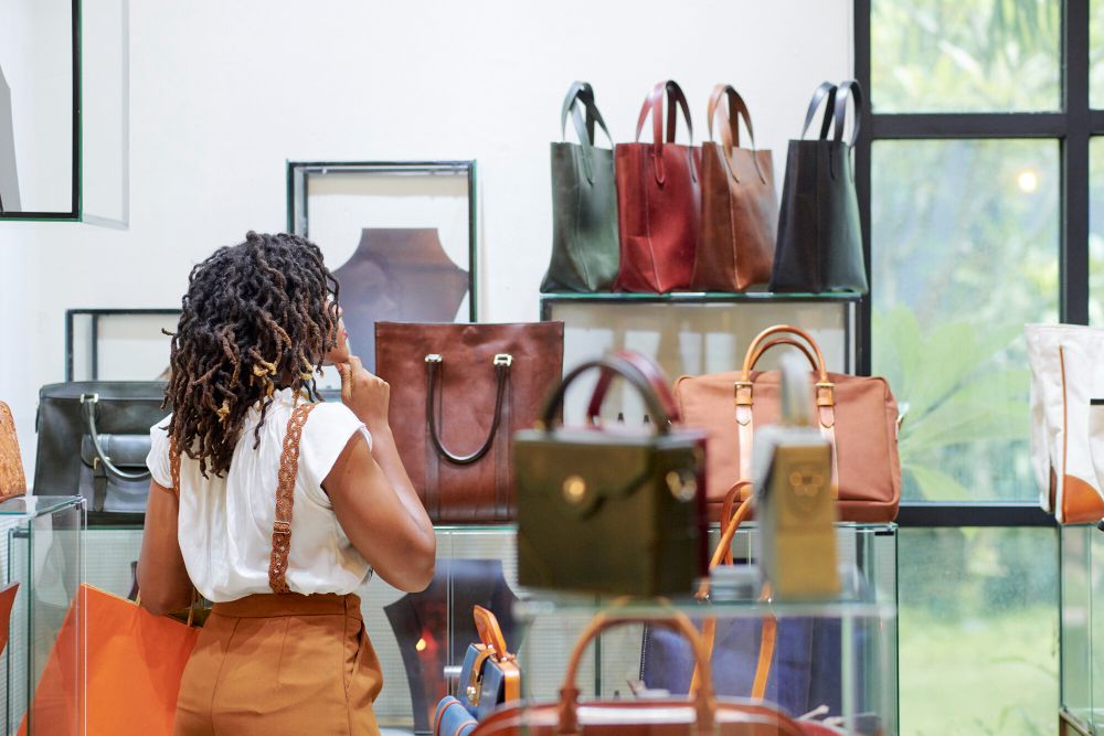 woman-buying-bag-in-the-shop